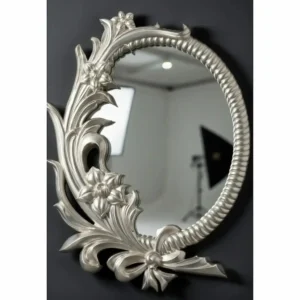 Side view of twisted rope and floral detail on oval frame